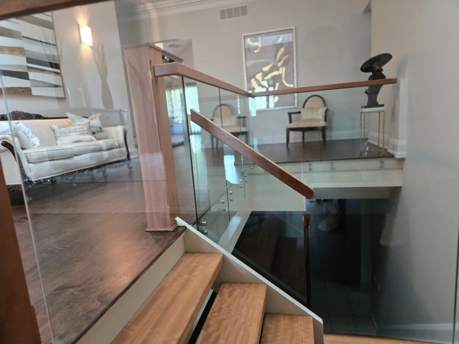 After-renovation final stairs and glass railing — dust removed and surfaces cleaned